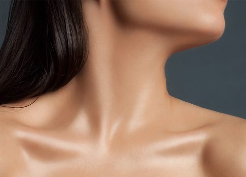 Photo of a woman's neck area after a neck lift