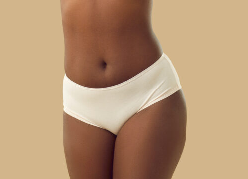 Photo of a woman's midsection and lower body